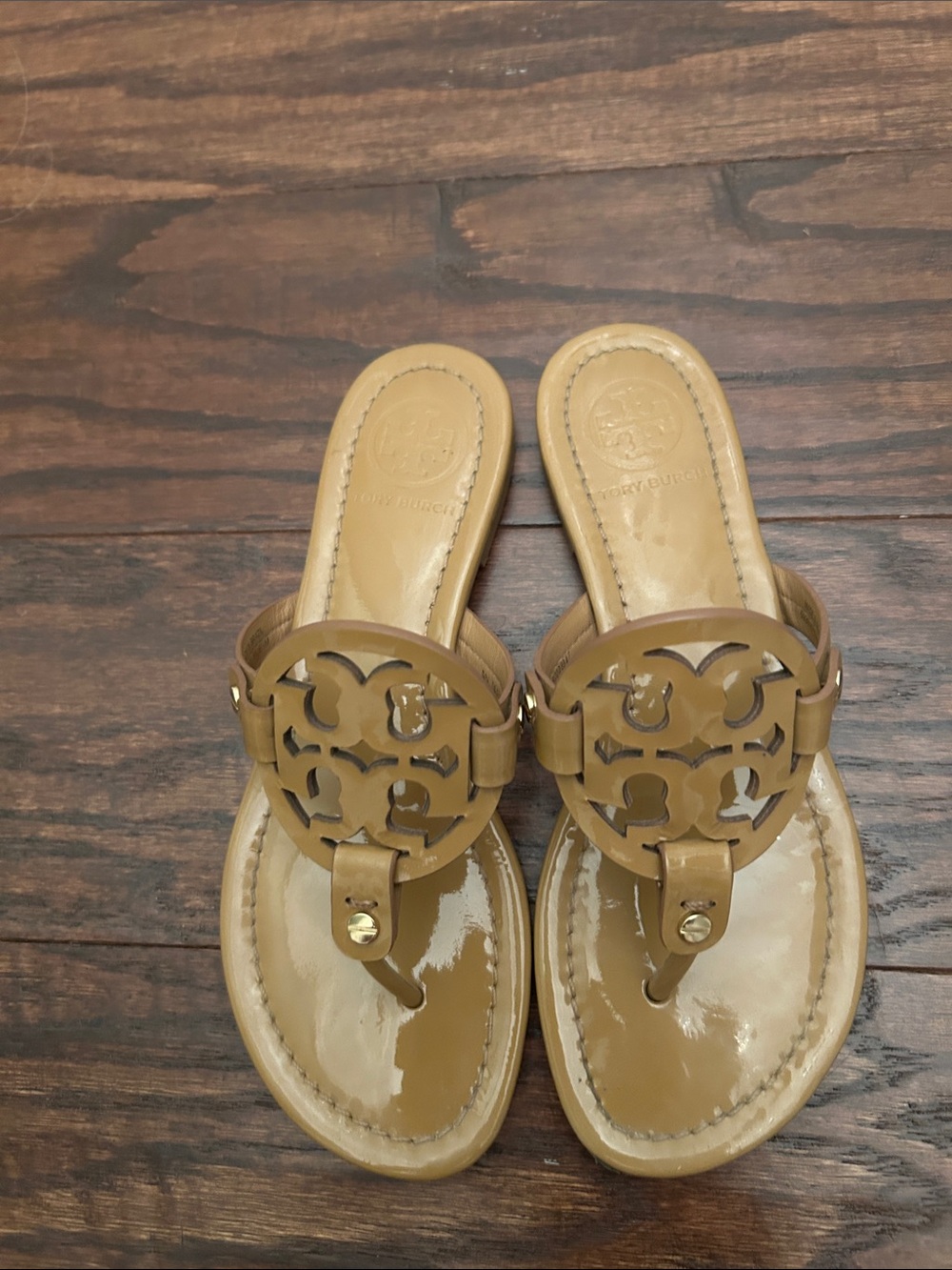 Tory Burch Miller Patent Leather Thong Sandals in Sand color